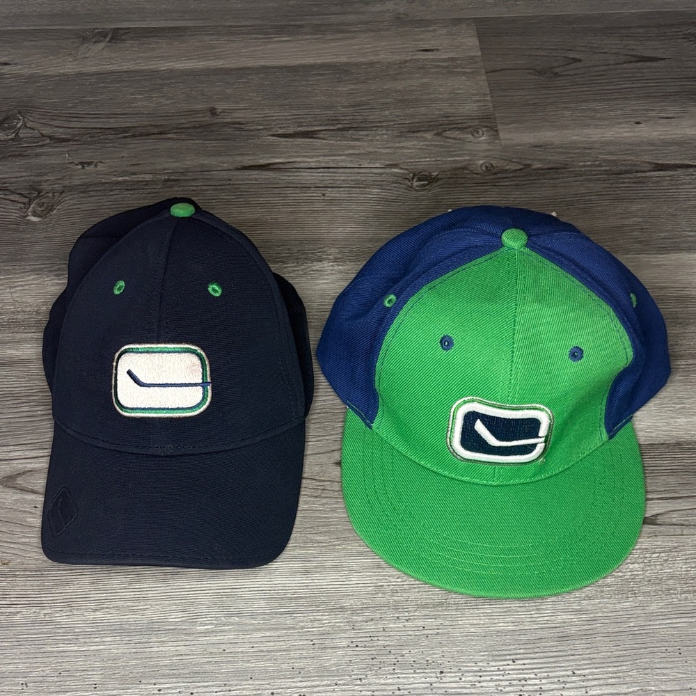Vancouver Canucks hats Blue American Needle M/Lg and Green Budweiser SnapBack